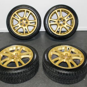 10-Spoke JDM 17-Inch Gold Enkei Wheels – 5×100 – Subaru Impreza WRX STI – Brembo Clearance